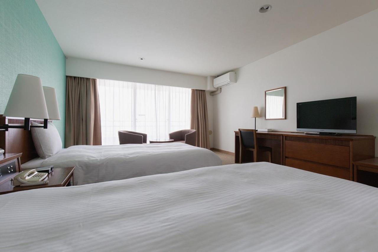 Em Wellness Kurashinohakko Lifestyle Resort Okinawa Pokoj fotografie